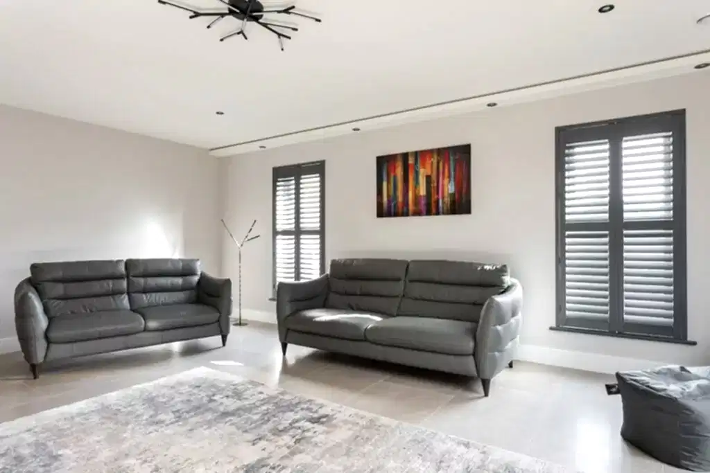 Basalt Grey Painted Plantation Shutters in Living Room - Village Blinds and Shutters Northern Ireland