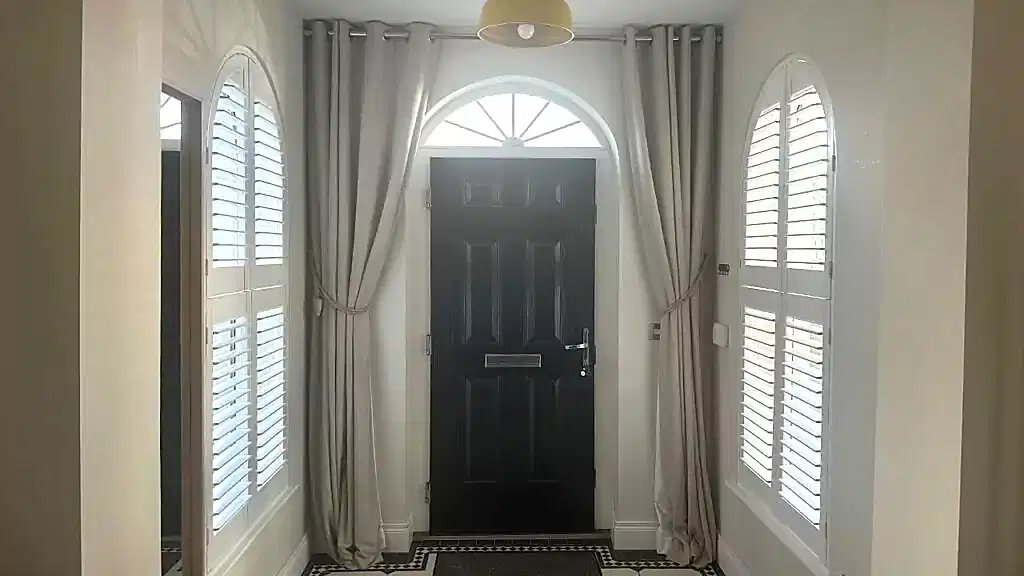 Arched shutter hallway modern white and black interior home new build northern ireland