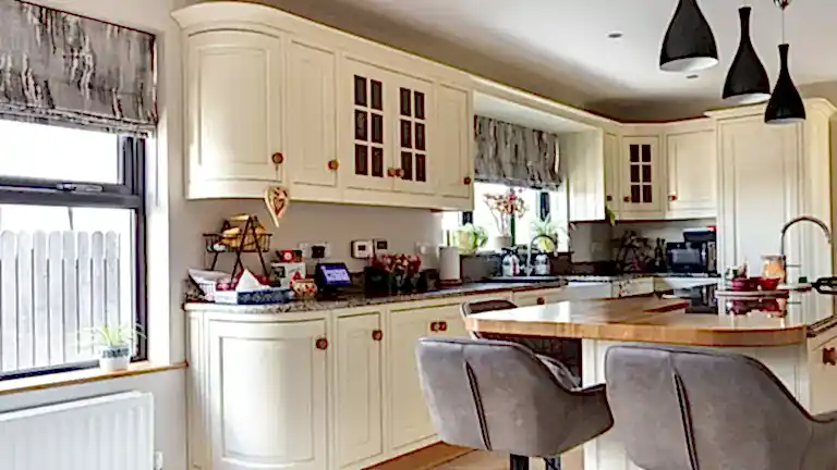 Nancy Meyers Aesthetic Roman Blinds Grey and White modern traditional style kitchen in northern ireland